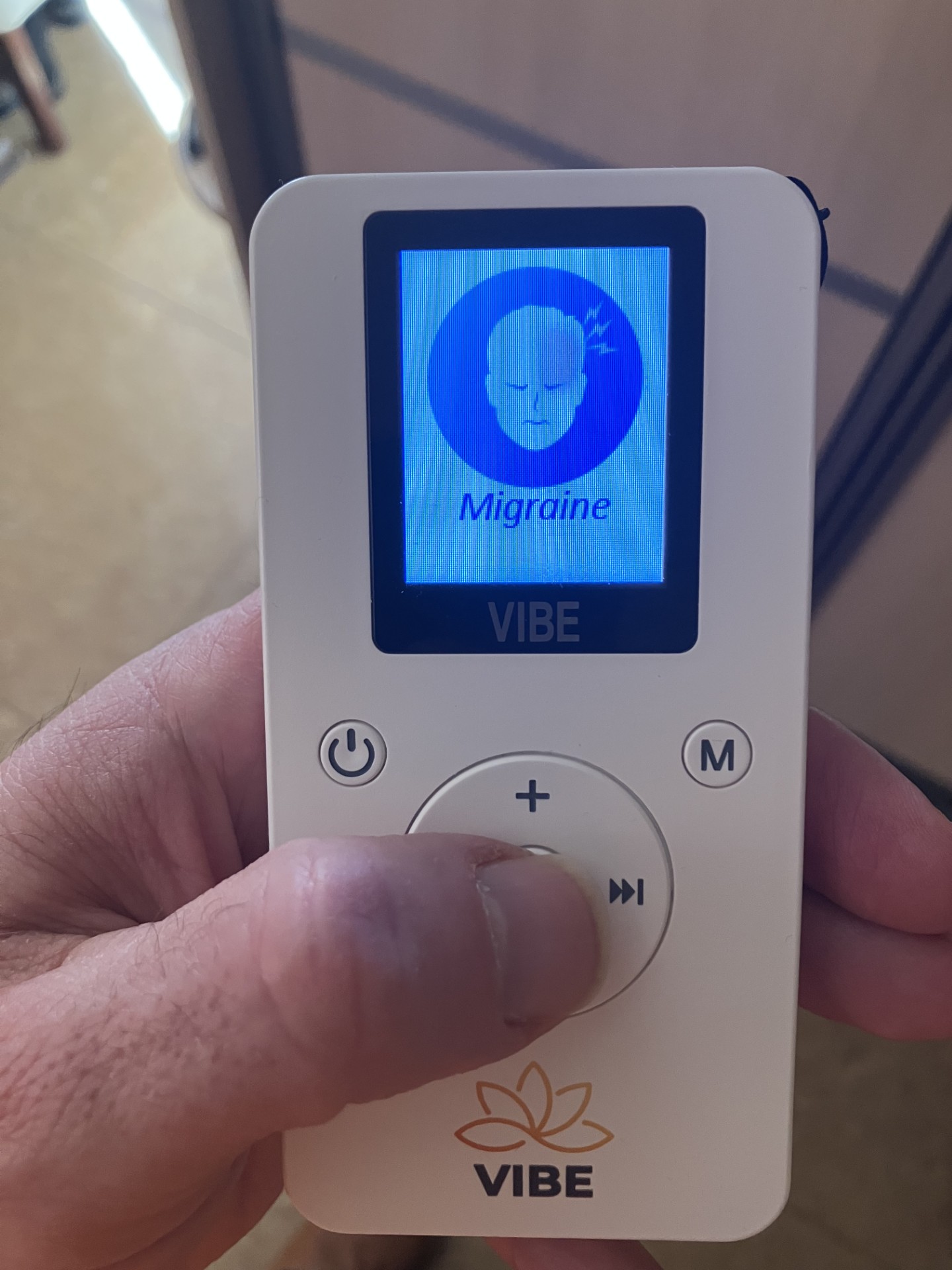 Vibe PEMF device showing migraine relief protocol program
