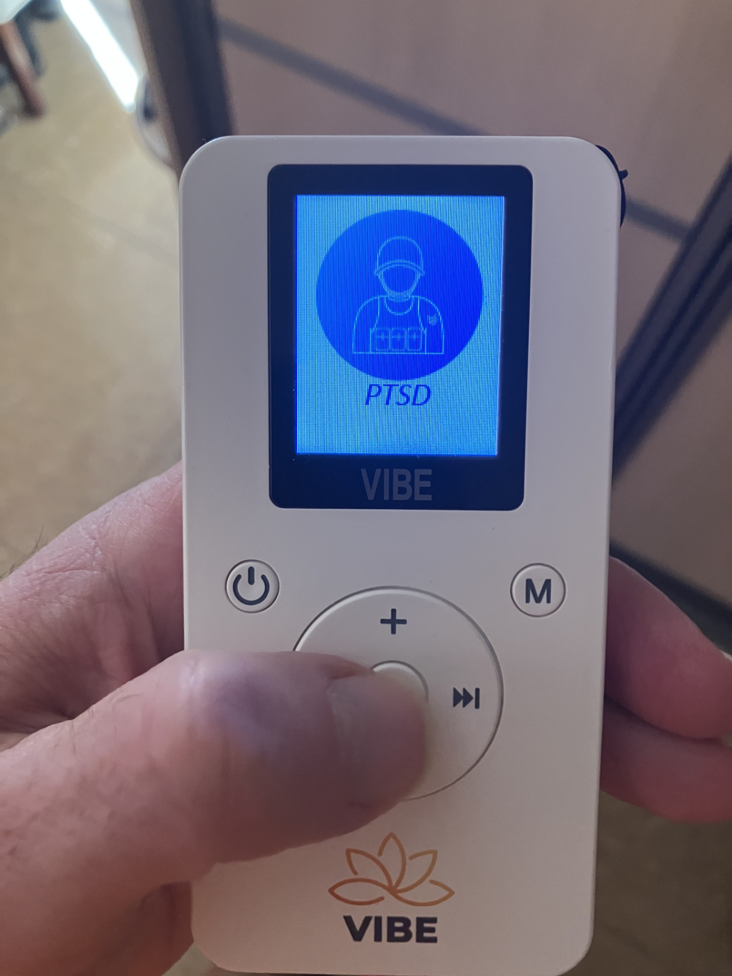 Vibe PEMF device showing PTSD protocol for mental wellness support